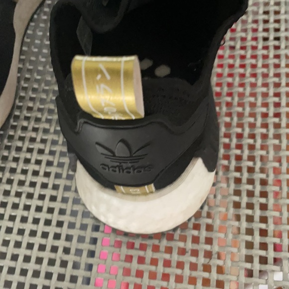 Adidas NMD gold/black. 10 1/2 in men